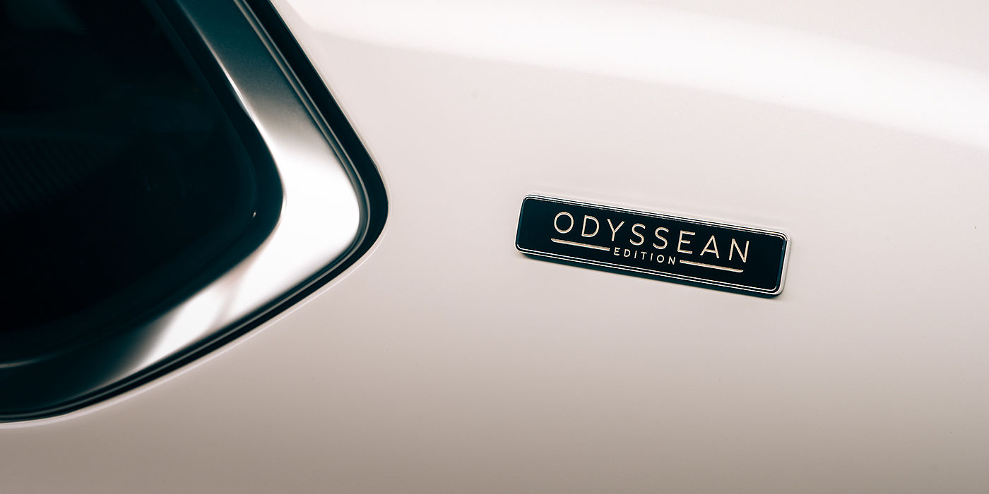 Bentley Sydney Bentley Bentayga Odyssean Edition SUV Odyssean badge close up with Snow Quartz Pearlescent by Mulliner paint