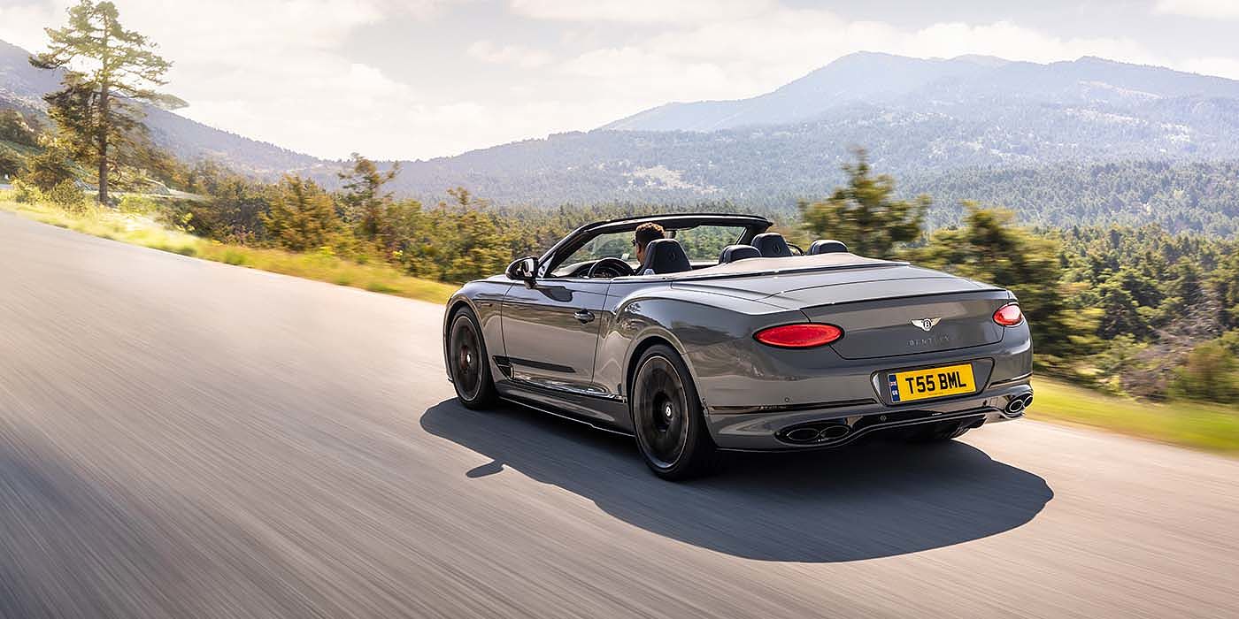 Bentley Sydney Bentley Continental GTC S convertible in Cambrian Grey paint rear 34 dynamic driving