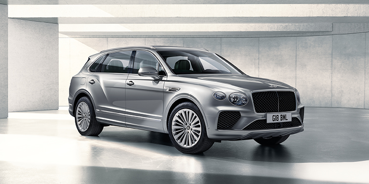 Bentley Sydney Bentley Bentayga Extended Wheelbase SUV front three quarter in Moonbeam paint with a grey background